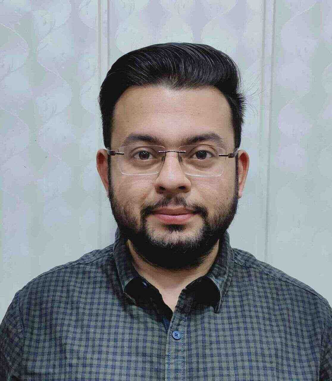 Dr. Johny Minia, MD Psychiatrist